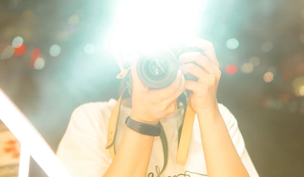 Overly bright photo flash is considered a facial occlusion